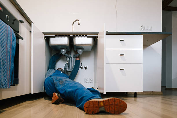 Professional Emergency Plumber technician working in Clarksville, IN